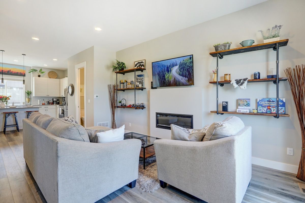 Living room with a fireplace and open shelving