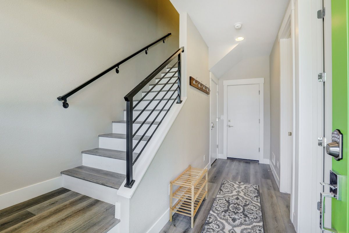 Stairwell with a black metal railing