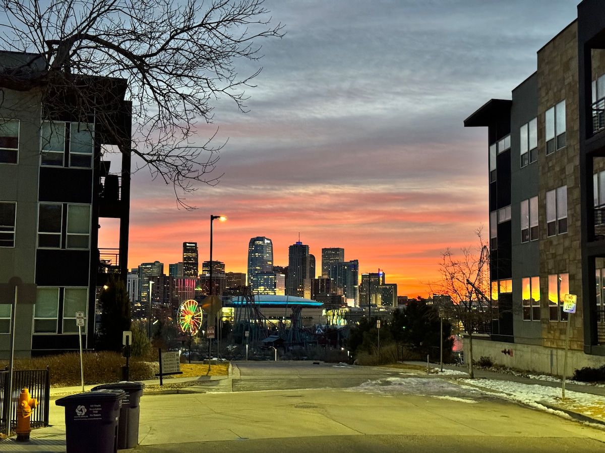 Denver skyline at sunset seen from the street outside the home