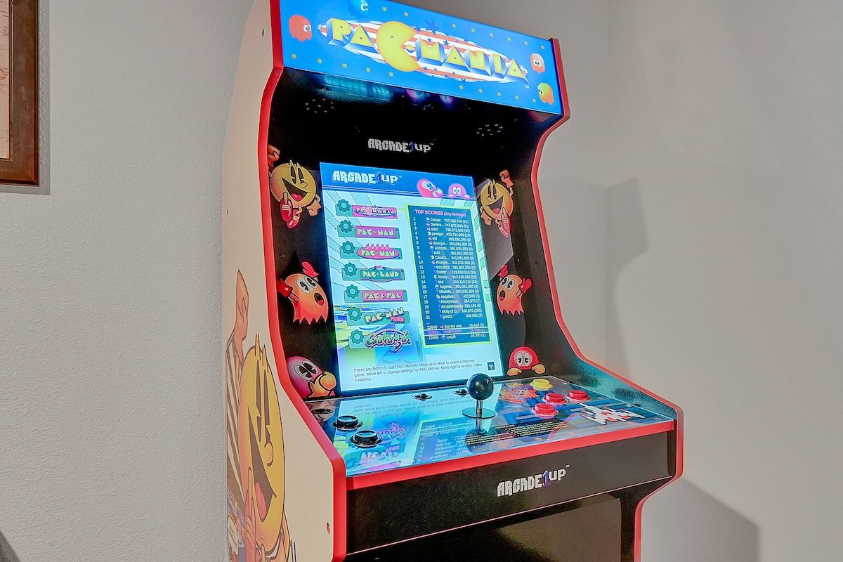 Ms. Pacman arcade cabinet in the game room