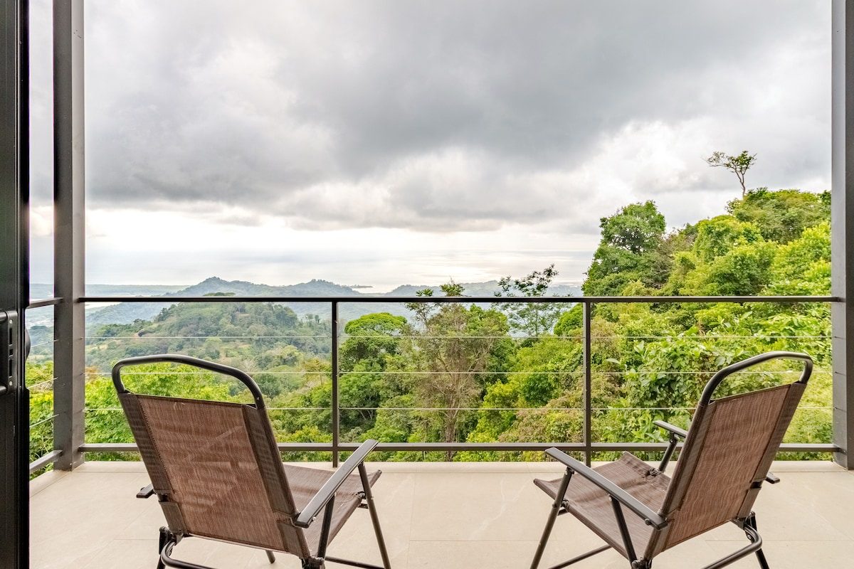 Terrace chairs looking out over the jungle valley toward the ocean